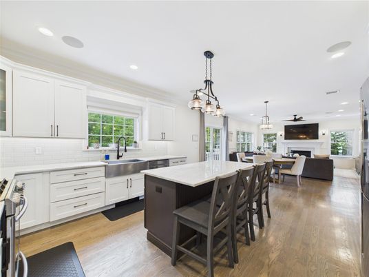 Dining room, Fireplace, Interior, Kitchen, Pendant Lights, Recessed Lighting, Stainless Steel Appliances, Wood Texture Flooring