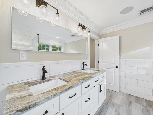 Bathroom, Dual Sink Vanities, Interior, Recessed Lighting, Wood Texture Flooring
