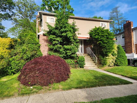 Exterior, Facade, Brick Facade, Raised Ranch