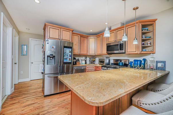 Interior, Kitchen, Pendant Lights, Recessed Lighting, Stainless Steel Appliances, Wood Texture Flooring