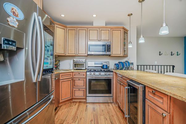 Interior, Kitchen, Pendant Lights, Recessed Lighting, Stainless Steel Appliances, Wood Texture Flooring