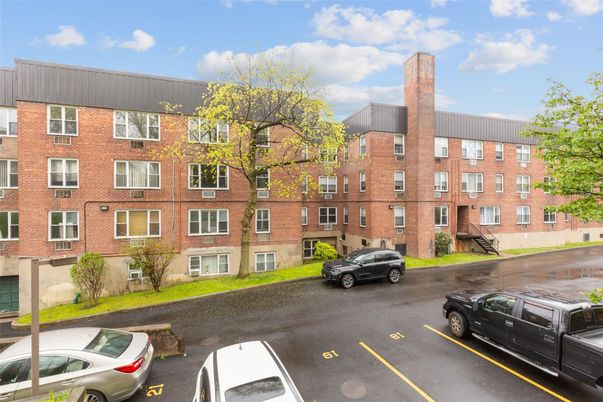 Exterior, Facade, Brick Facade, Condo Building