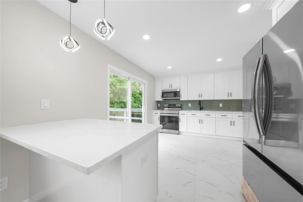 Interior, Kitchen, Marble, Pendant Lights, Recessed Lighting, Stainless Steel Appliances