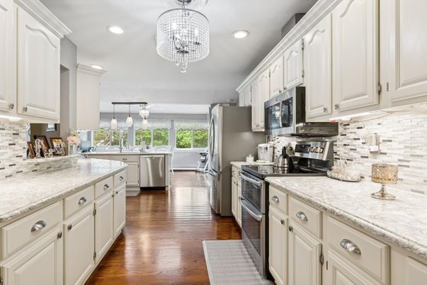 Chandelier, Interior, Kitchen, Recessed Lighting, Stainless Steel Appliances, Wood Texture Flooring