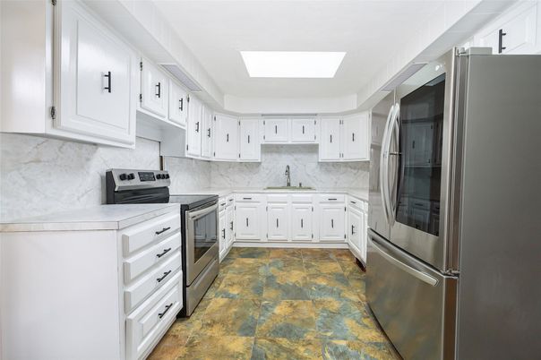 Interior, Kitchen, Marble Walls, Stainless Steel Appliances