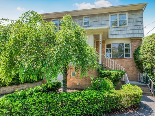 Exterior, Facade, Brick Facade, Raised Ranch