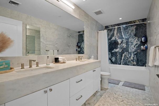 Bathroom, Dual Sink Vanities, Interior, Marble Walls, Recessed Lighting