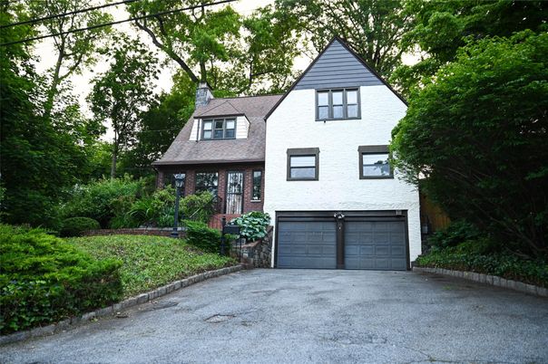 Attached, Exterior, Facade, Brick Facade, Tudor Revival