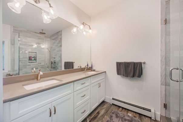 Bathroom, Dual Sink Vanities, Glass Shower, Interior, Wood Texture Flooring
