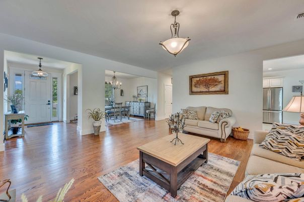 Chandelier, Dining room, Interior, Kitchen, Living room, Pendant Lights, Stainless Steel Appliances, Wood Texture Flooring