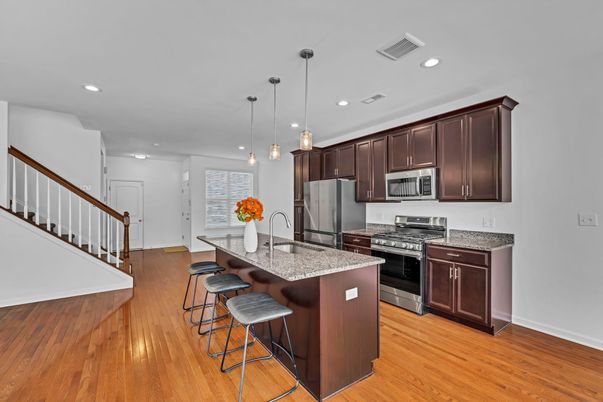 Interior, Kitchen, Pendant Lights, Recessed Lighting, Stainless Steel Appliances, Wood Texture Flooring