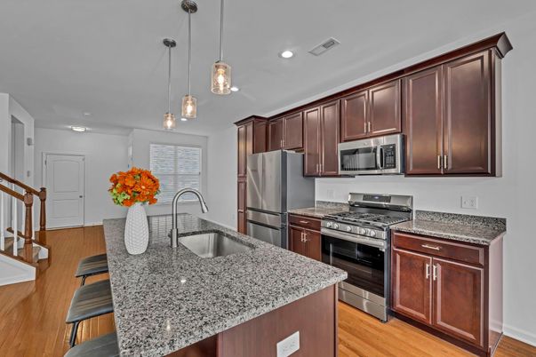 Interior, Kitchen, Pendant Lights, Recessed Lighting, Stainless Steel Appliances, Wood Texture Flooring