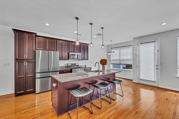 Interior, Kitchen, Pendant Lights, Recessed Lighting, Stainless Steel Appliances, Wood Texture Flooring