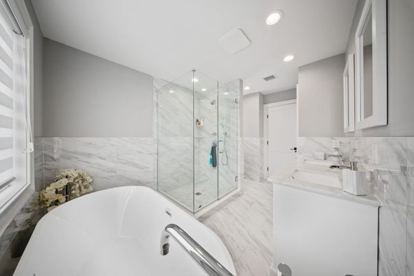 Bathroom, Dual Sink Vanities, Free Standing Baths, Glass Shower, Interior, Marble, Marble Walls, Recessed Lighting