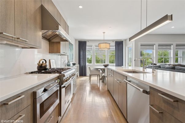 Dining room, Interior, Kitchen, Pendant Lights, Recessed Lighting, Stainless Steel Appliances, Wood Texture Flooring