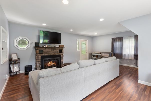Fireplace, Interior, Living room, Recessed Lighting, Wood Texture Flooring