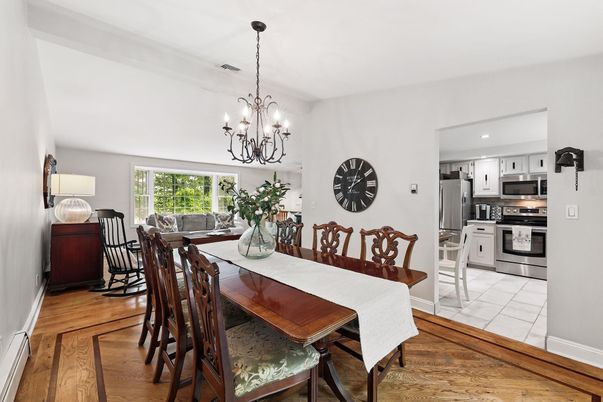 Chandelier, Dining room, Interior, Kitchen, Recessed Lighting, Stainless Steel Appliances, Wood Texture Flooring