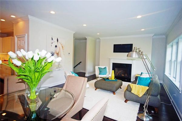 Dining room, Fireplace, Interior, Living room, Recessed Lighting, Wood Texture Flooring
