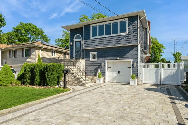 Attached, Exterior, Facade, Raised Ranch