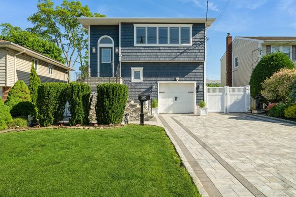 Attached, Exterior, Facade, Raised Ranch