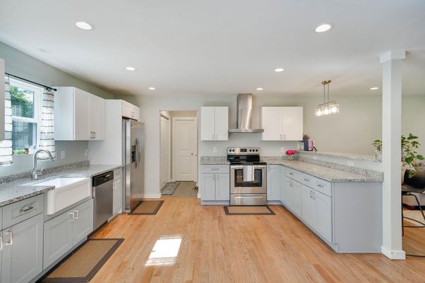Interior, Kitchen, Pendant Lights, Recessed Lighting, Stainless Steel Appliances, Wood Texture Flooring