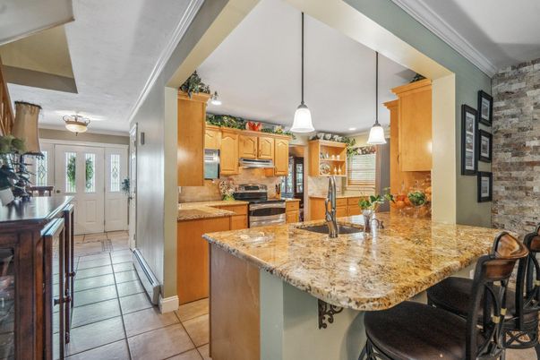 Interior, Kitchen, Pendant Lights, Recessed Lighting, Stainless Steel Appliances, Stone Walls