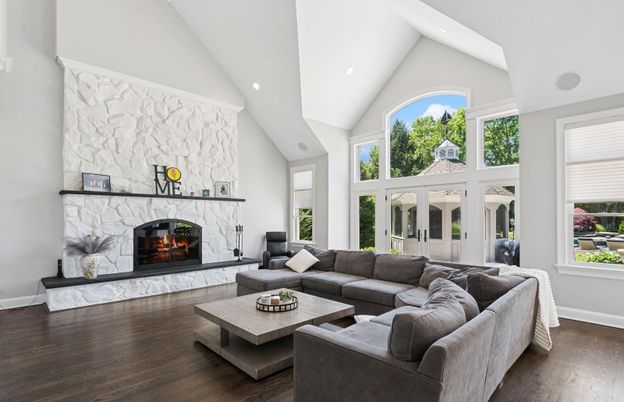 Fireplace, Interior, Living room, Recessed Lighting, Stone Walls, Wood Texture Flooring