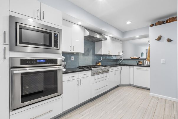 Interior, Kitchen, Recessed Lighting, Stainless Steel Appliances, Wood Texture Flooring