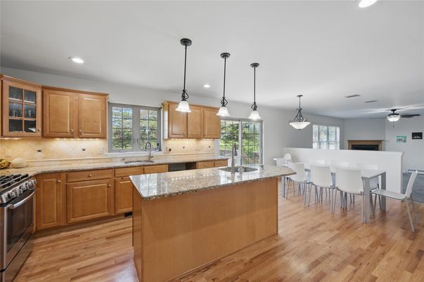 Dining room, Interior, Kitchen, Pendant Lights, Recessed Lighting, Stainless Steel Appliances, Wood Texture Flooring