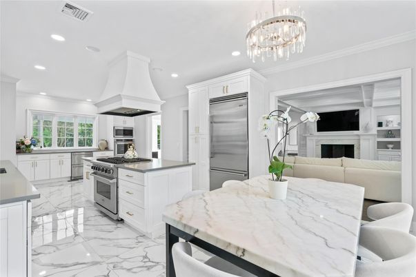 Fireplace, Interior, Kitchen, Living room, Marble, Pendant Lights, Recessed Lighting, Stainless Steel Appliances