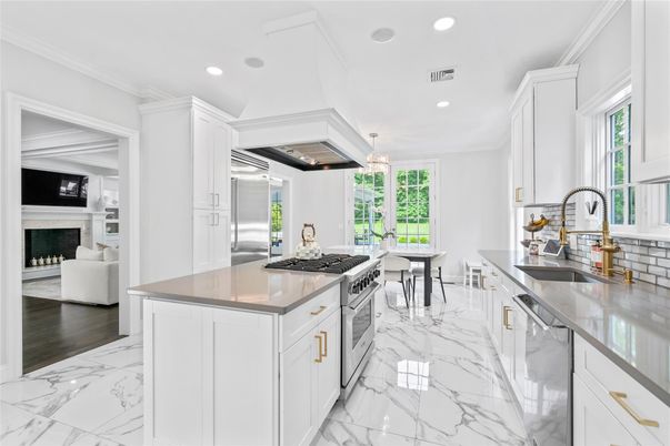 Fireplace, Interior, Kitchen, Living room, Marble, Pendant Lights, Recessed Lighting, Stainless Steel Appliances