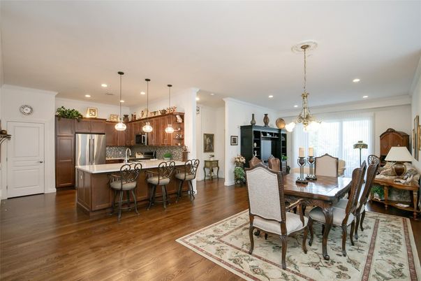 Dining room, Interior, Kitchen, Pendant Lights, Recessed Lighting, Stainless Steel Appliances, Wood Texture Flooring