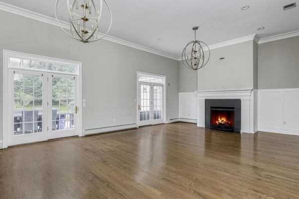 Chandelier, Empty room, Fireplace, Interior, Pendant Lights, Recessed Lighting, Wood Texture Flooring