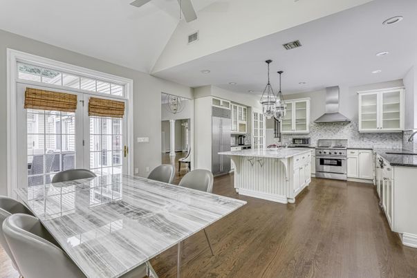 Chandelier, Dining room, Interior, Kitchen, Pendant Lights, Recessed Lighting, Stainless Steel Appliances, Wood Texture Flooring