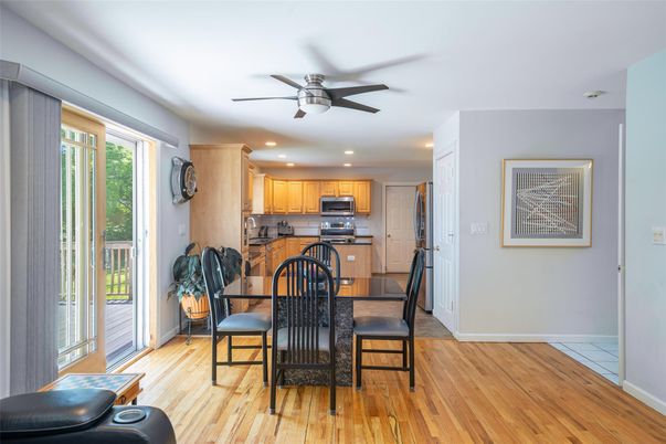 Dining room, Interior, Kitchen, Recessed Lighting, Stainless Steel Appliances, Wood Texture Flooring