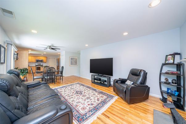 Dining room, Interior, Kitchen, Living room, Recessed Lighting, Stainless Steel Appliances, Wood Texture Flooring