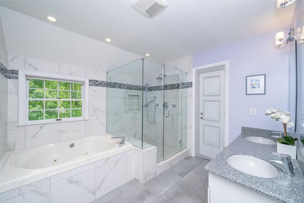 Bathroom, Dual Sink Vanities, Glass Shower, Interior, Marble Walls, Recessed Lighting
