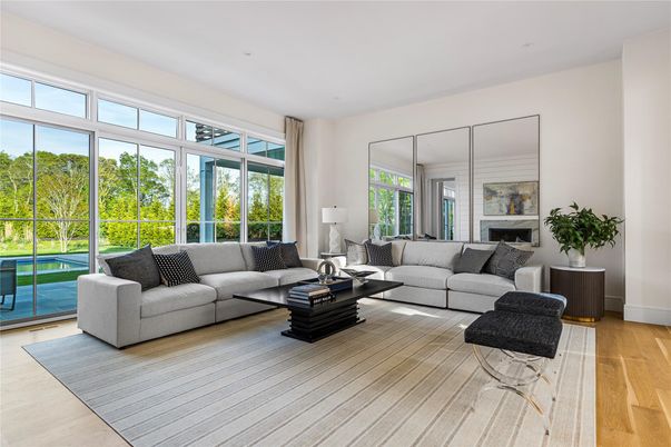 Fireplace, Interior, Living room, Recessed Lighting, Sun Room, Wood Texture Flooring