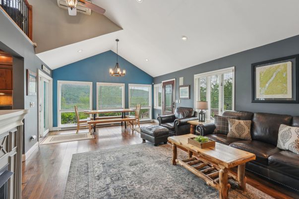 Chandelier, Dining room, Fireplace, Interior, Living room, Recessed Lighting, Wood Texture Flooring