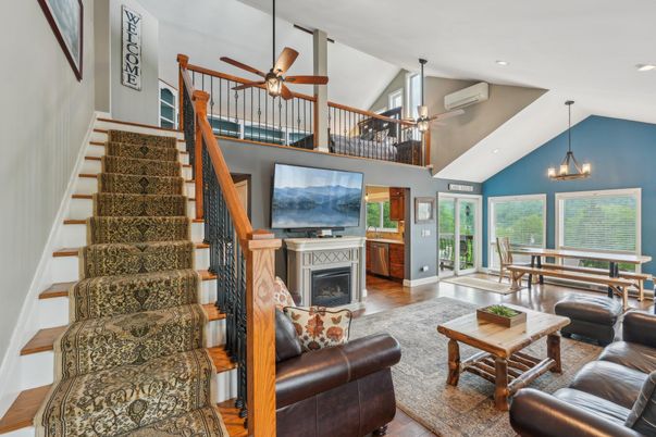 Chandelier, Dining room, Fireplace, Interior, Living room, Recessed Lighting, Wood Texture Flooring
