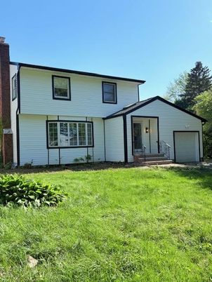 Attached, Backyard, Exterior, Facade, Brick Facade, Farmhouse