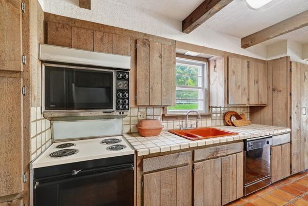 Interior, Kitchen, Tile Countertops, Wooden Beams