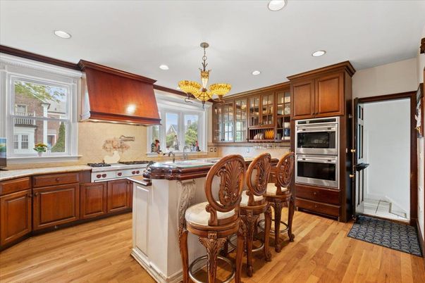 Chandelier, Interior, Kitchen, Pendant Lights, Recessed Lighting, Stainless Steel Appliances, Wood Texture Flooring