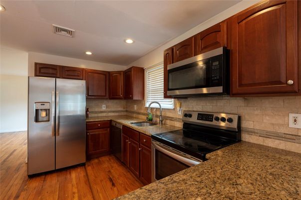 Interior, Kitchen, Recessed Lighting, Stainless Steel Appliances, Wood Texture Flooring