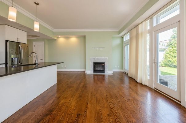 Empty room, Fireplace, Interior, Kitchen, Pendant Lights, Recessed Lighting, Wood Texture Flooring