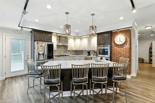 Interior, Kitchen, Pendant Lights, Recessed Lighting, Stainless Steel Appliances, Stone Walls, Wood Texture Flooring