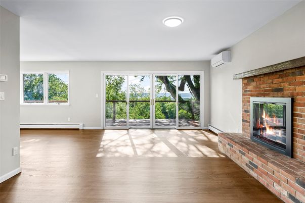 Empty room, Fireplace, Interior, Recessed Lighting, Stone Walls, Wood Texture Flooring