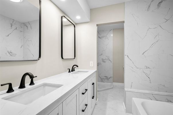 Bathroom, Dual Sink Vanities, Interior, Marble, Marble Walls, Recessed Lighting