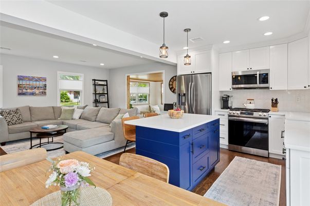 Dining room, Interior, Kitchen, Living room, Pendant Lights, Recessed Lighting, Stainless Steel Appliances, Wood Texture Flooring