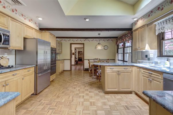 Dining room, Interior, Kitchen, Pendant Lights, Recessed Lighting, Stainless Steel Appliances, Wood Texture Flooring